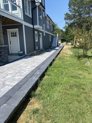 Another view of that paver walkway with a retaining wall. I will get another picture of the final product with stone and plants.