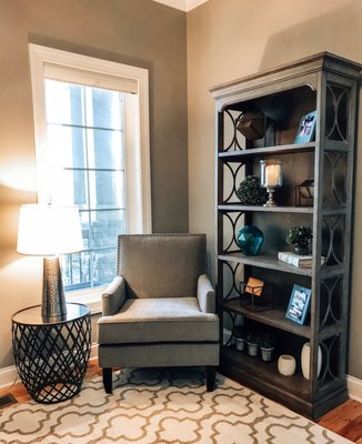 Accent chair and bookcase.