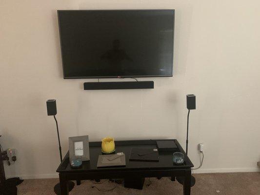 Mounted tv and sound bar. Ran cables through the wall.