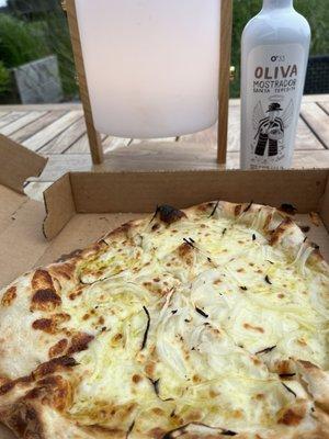 Cheese and onion pizza and their own brand of olive oil