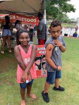 Kids enjoyed their tattoos at Gwinnett summer movie night.