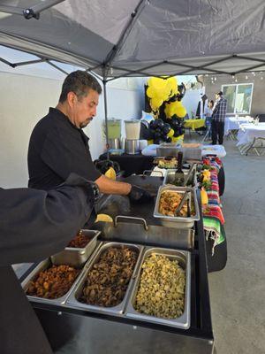 Bertha's display of delicious food and aguas frescas