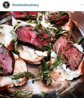 Toasted Rosemary crustini topped w/ Caramelized onion-marscapone cheese & grass fed beef tenderloin. Organic basil.