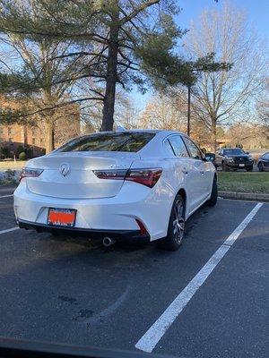 Acura (sedan) after exterior wash and wax.