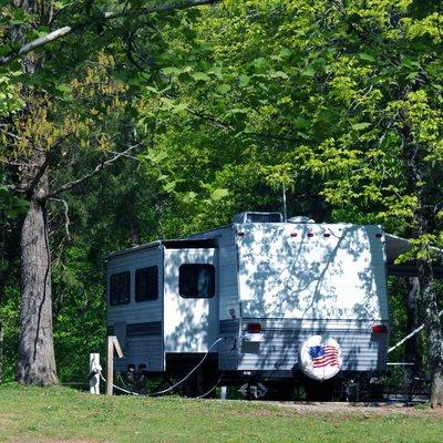 Be careful when pulling your RV into wooded campgrounds this summer. A low-hanging branch could rake your ride (and your wallet) if you don'