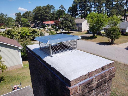 After single flue stainless steel crown mount cap, seal for chimney crown/wash, caulk on top of brick out to cover holes in brick