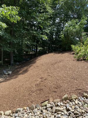 Job 2:   Clear the weeds on this hill.  Lay sand, then weed guard material.  Finish with mulch.  So clear now!