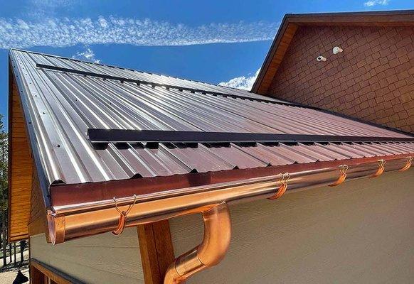 Copper half-round gutters installed in Leadville, CO