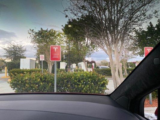 Tesla charging sign