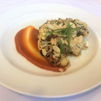 Cauliflower Steak with chili glaze, carrot puree, almonds, sesame, and Thai peanut quinoa.