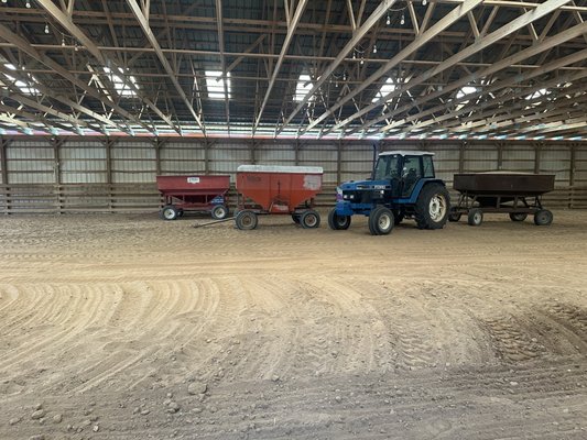 An example of the farm equipment filling the indoor arena. These sat here for a month.