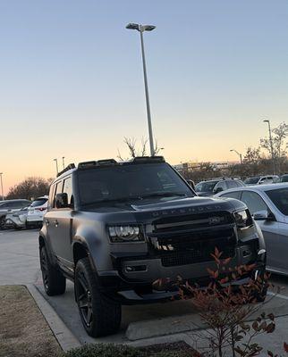 Black trim, hood, flares and side molding all protected.