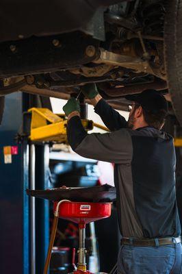 One of our Certified Technicians working on a customers vehicle.