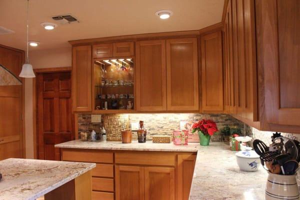 Custom beach wood cabinets and island