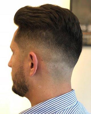 An executive cut with a mid drop skin fade. For those who prefer to get a haircut every 3weeks to a month, this cut will grow out smoothly