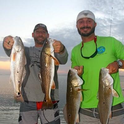 Scott and Jordan quadrupled up on redfish in mosquito lagoon!