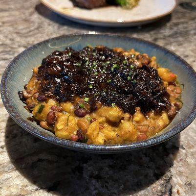 Zulu Oxtail Samp and Beans: Cracked Hominy, Sea Peas, Fragrant Masala and Braised Oxtail