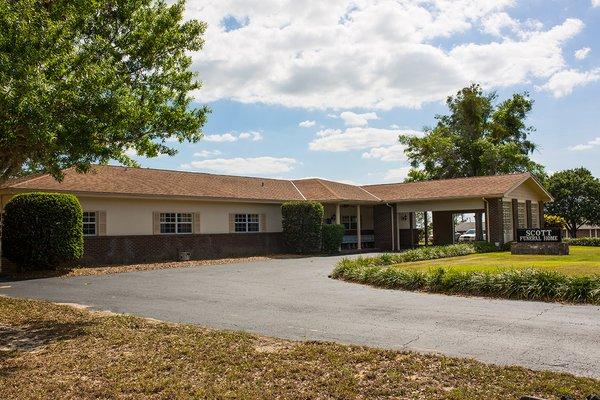 Scott Funeral Home was established in 1962 by Dixie Scott, who lived at the location with his family until his retirement.