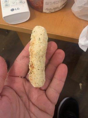 It's supposed to be a cooked mozzarella stick. Hardly.