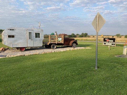 Street sign and display camper