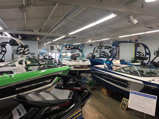 Photos of new Nautique ski, wakeboard and wakesurf boats in our showroom at Wawasee Boat Company