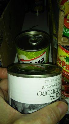 Told them about these bulging cans of Italian cherry tomatoes. They took the two I gave them left rest on shelves!! Wtf?!?