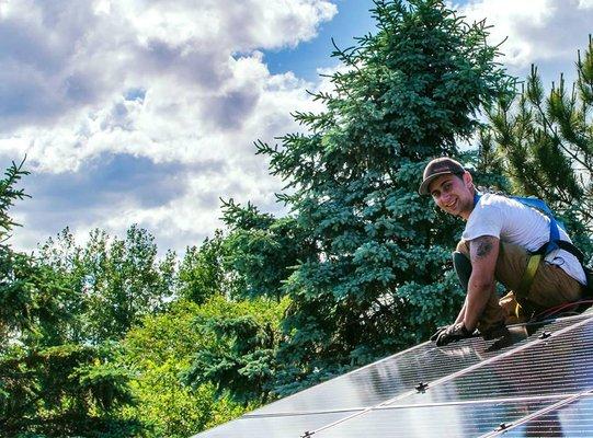 A Sundog Solar installer in Camden, ME