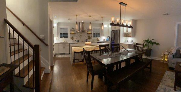 This large kitchen space used to have a tiny kitchen next to a tiny dining room separated by a wall.  There was a wall separating this room.