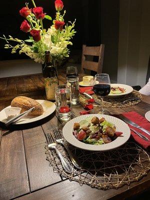 Starters (split the house salad, French onion soup) and bread.