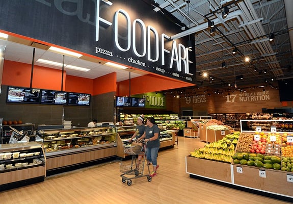 Prepared foods counter near the produce section within this Price Chopper