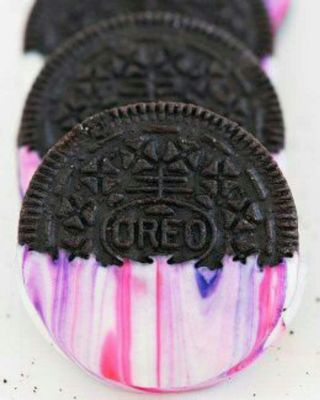 Crazy fun oreos...oreos dipped in white chocolate swirled with fun colors. Have fun with your food $3 a dozen.