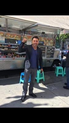 Golden Boy eating a burger @ Juana la Qubana  outside work.