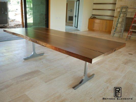 Walnut Top with Solid Billet Steel Base.