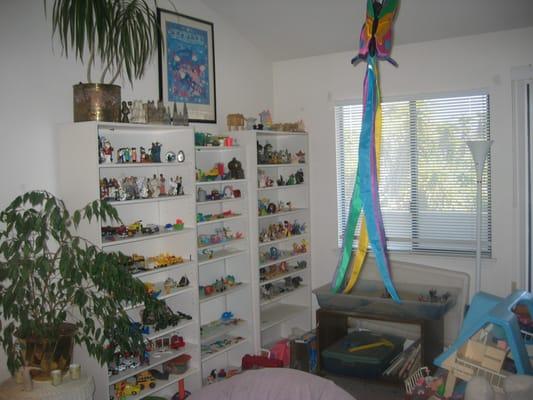 Sandtray shelves of miniature items to be used for sandtray therapy which is useful for both children and adults.