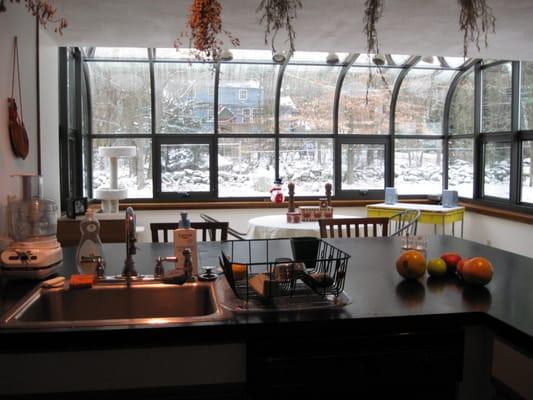 Interior sunroom added off kitchen.