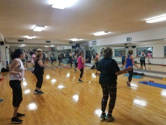 Group Fitness! And look at that floor shine. Keeping it clean and safe for our members!