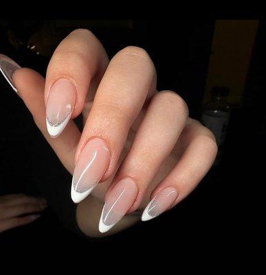 Acrylic nails with elegant French tip design