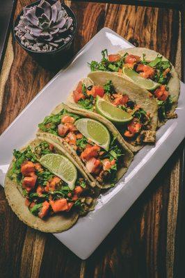 Chick'n Tacos with Roasted potatoes and black beans.