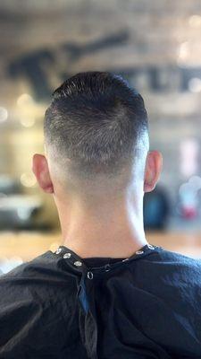 Back of the Low Bald Fade Stylist: Robyn