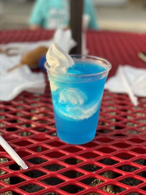 Blue raspberry slush puppie with vanilla ice cream.