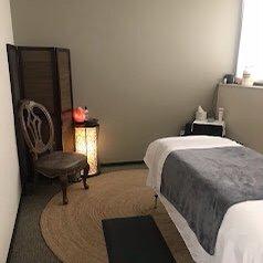 Comfortable & cozy room with heated massage table.