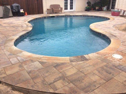 Add a paver deck to your pool exterior