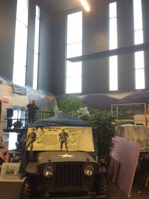 Getting ready to install film to protect the displays & artwork along with reducing the glare at  Iowa Gold Star Military Museum