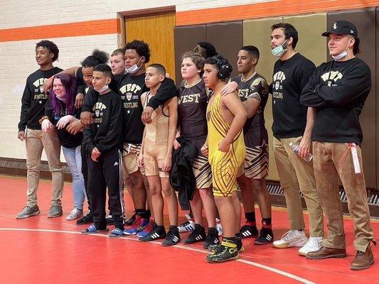 CEO Max Metzgar and his highschool wrestling team, West HS