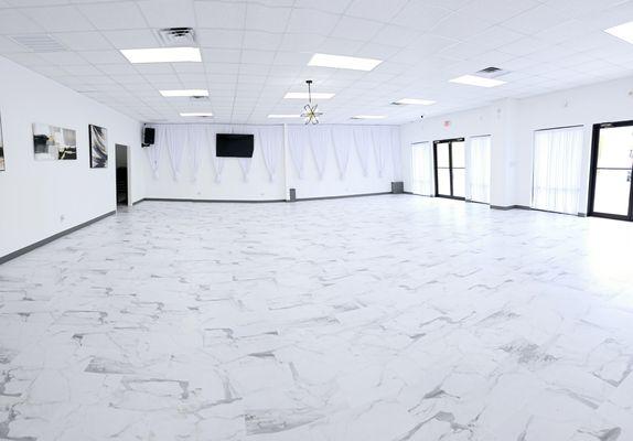 The building spans 2,300 sq ft with a 1,500 sq ft venue area. This versatile space is a blank canvas, ready to be transformed for your event