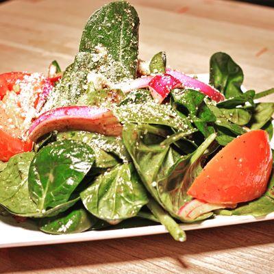 Spinach Salad, with homemade balsamic vinaigrette  and sprinkled with parmesan cheese