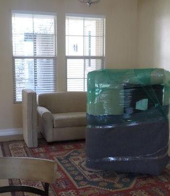 To ensure no scuff marks on fabric, we wrap your furniture.