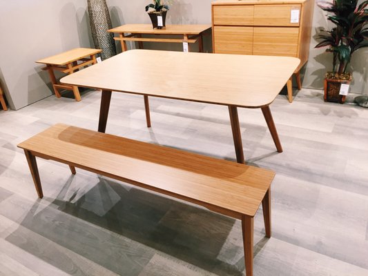 Bamboo table with bench seating.