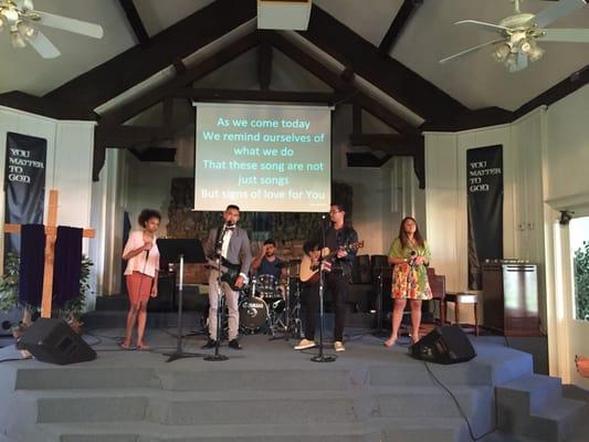 Agape worship team preparing to worship God.