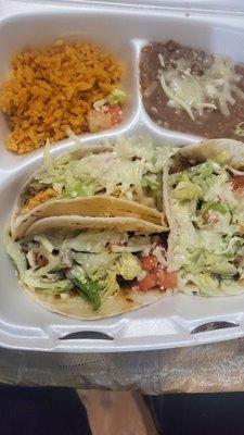 Chicken, pork& lengua on flour with cheese, lettuce & tomatoes well SEASONED.  Food was cook to order Definitely will be back again.